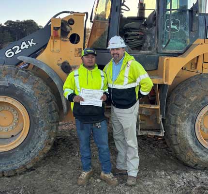 Rubber Tire Operator Drives Safe Work